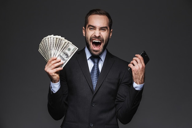 Premium Photo | Portrait of a confident handsome businessman wearing ...