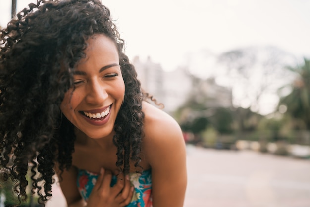 Premium Photo | Portrait of confident woman laughing.