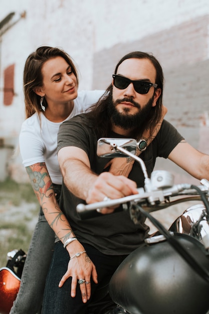 Free Photo Portrait Of A Cool Biker Couple