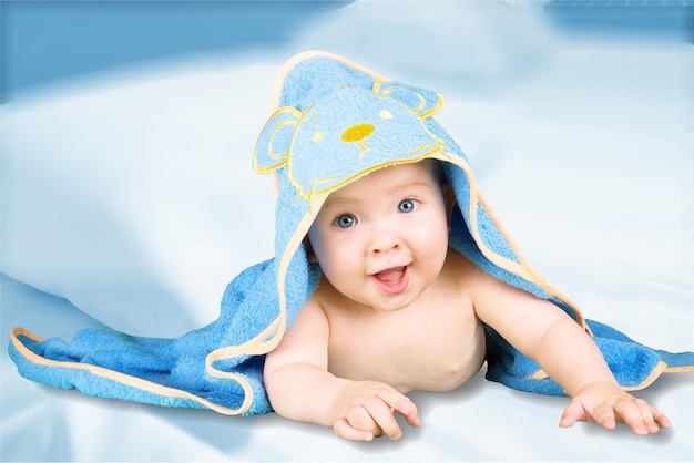 Premium Photo | Portrait of cute baby boy on light background