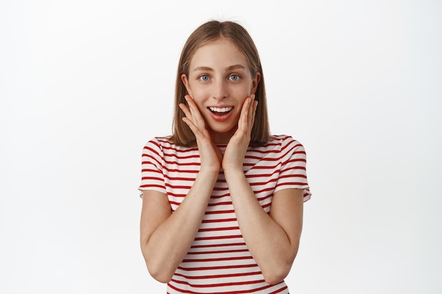 Premium Photo Portrait Of Delighted Smiling Blond Girl Feel Flattered