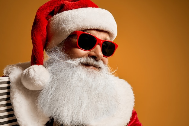 Premium Photo | Portrait of elder saint nicholas in red sunglasses