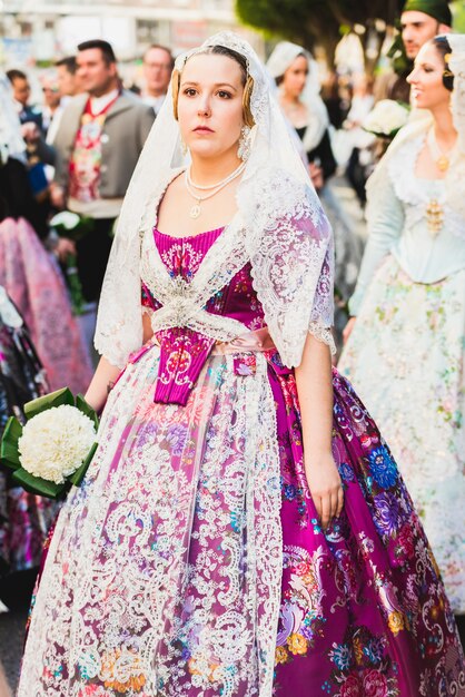 Premium Photo | Portrait of falleras women, wearing the traditional ...