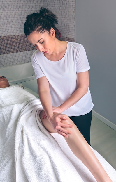 Premium Photo | Portrait of female massage therapist doing lymphatic ...