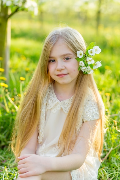 Premium Photo | Portrait of a girl with a flower in her hair