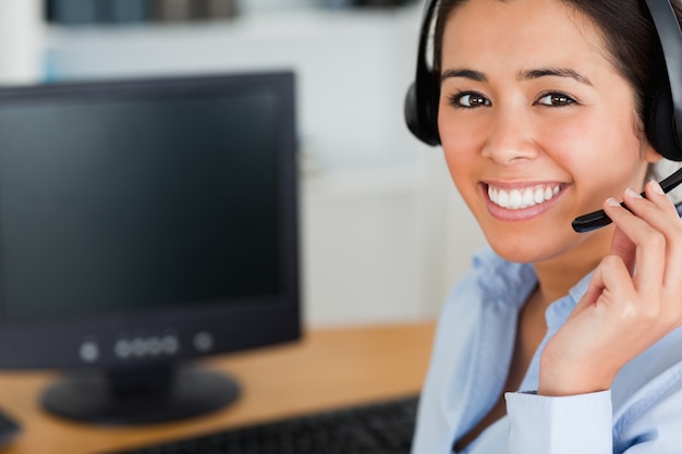 premium-photo-portrait-of-a-good-looking-woman-wearing-a-headset-and