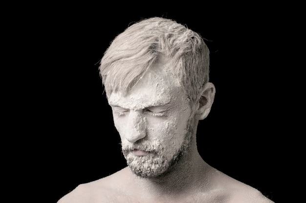 Premium Photo | Portrait of a guy in white powder