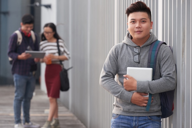 Portrait of handsome asian student Free Photo