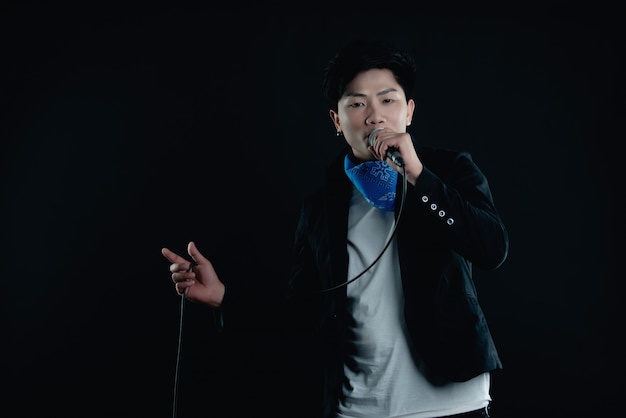 Portrait of handsome attractive singer Free Photo