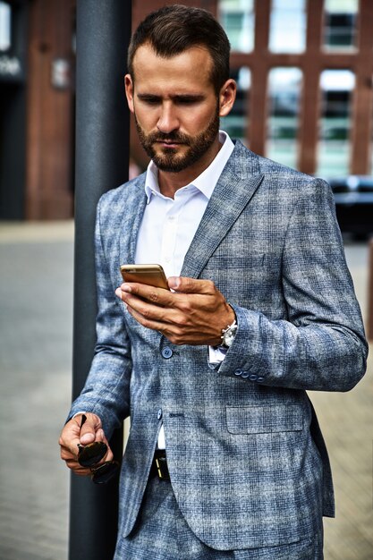 Free Photo | Portrait of handsome fashion businessman model dressed in ...