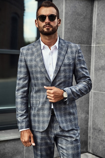 Free Photo | Portrait of handsome fashion businessman model dressed in ...