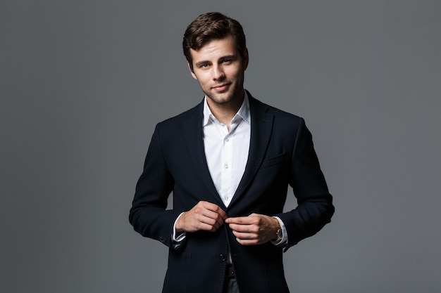 Premium Photo Portrait Of A Handsome Young Businessman Dressed In