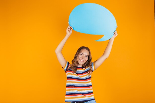 Premium Photo | Portrait of a happy young girl standing isolated