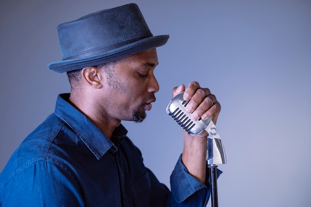 black singer with hat