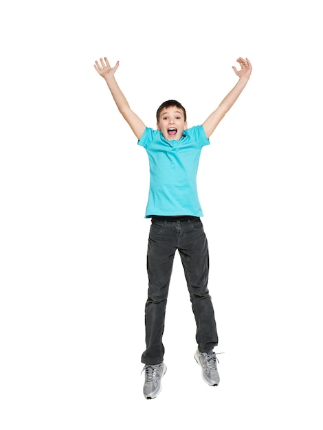 Free Photo | Portrait of laughing happy teen boy jumping with raised ...