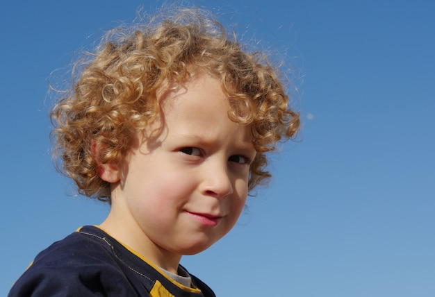 Portrait Of Little Boy Blond And Curly Photo Premium Download