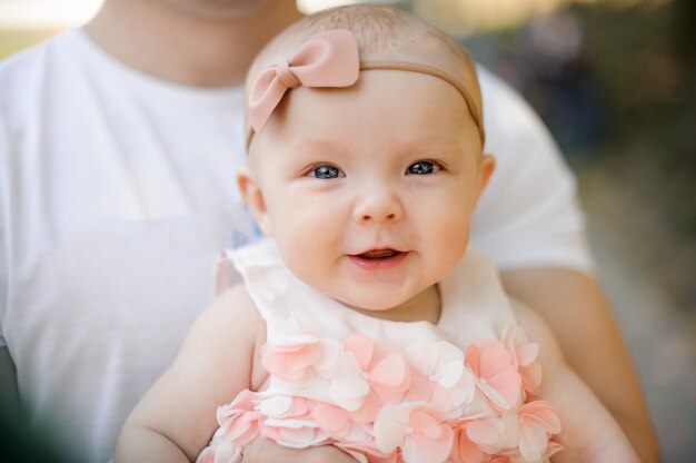 cute baby girl with father