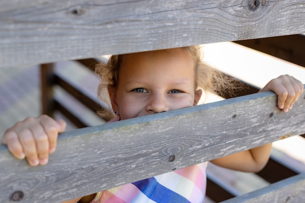 Premium Photo | Portrait of little girl child looking at the camera ...