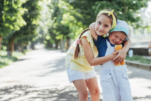 Premium Photo | Portrait of a little girl and her brother.