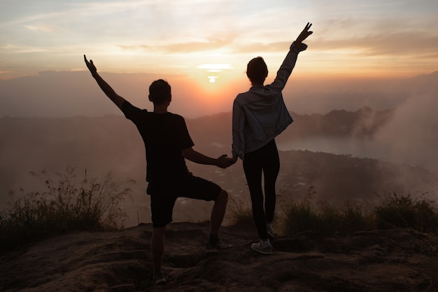 Free Photo | Portrait. lovers cuddle at dawn on the volcano batur. bali ...