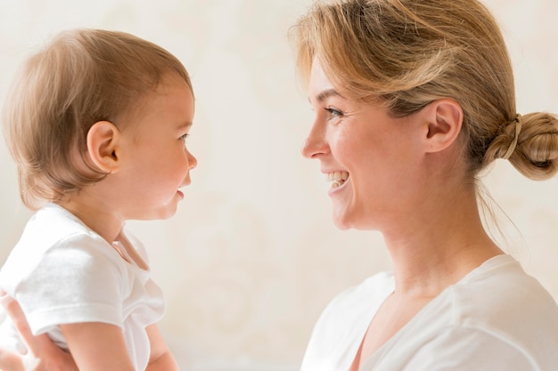 baby looking at mom