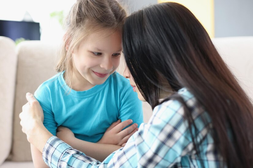 Premium Photo | Portrait of mother and daughter having kind talk ...