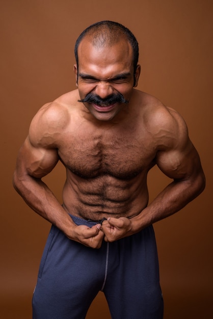 Premium Photo Portrait Of Muscular Indian Man With Mustache Shirtless