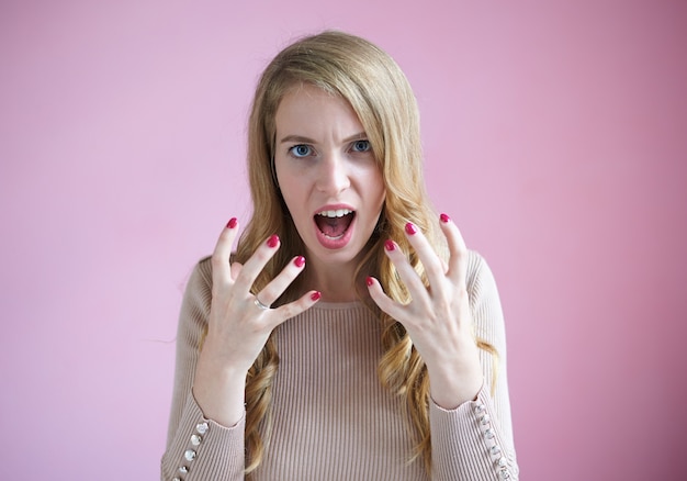 fairhair girl with pink nails