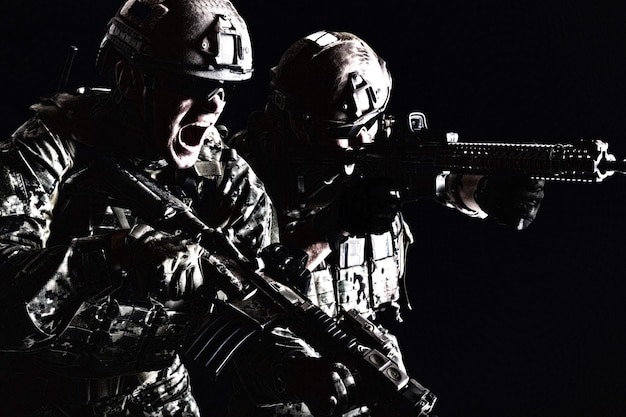 Premium Photo | Portrait of pair two special forces soldiers in field ...