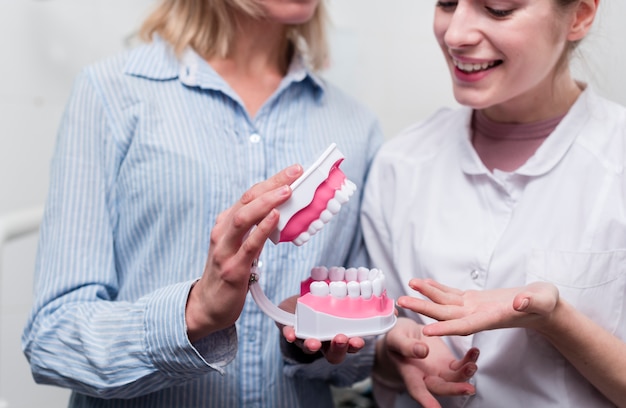 Free Photo | Portrait of patient and the dentist