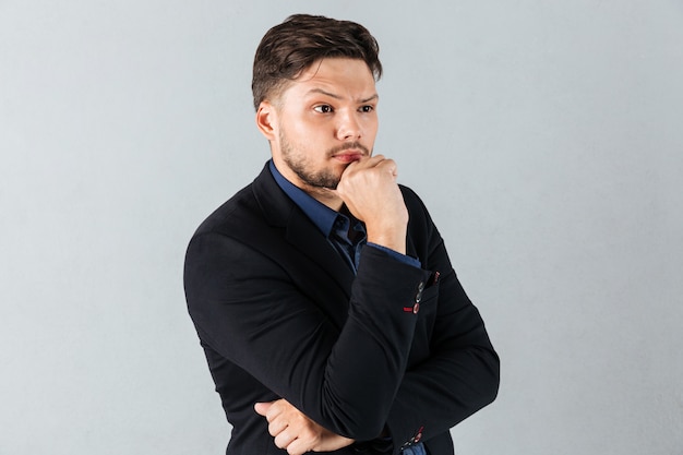 free-photo-portrait-of-a-pensive-businessman