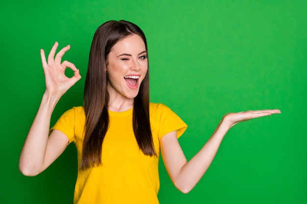 Premium Photo | Portrait of positive cheerful girl promoter hold hand ...