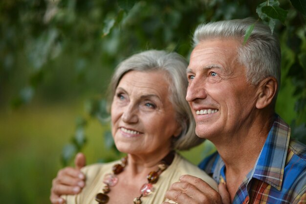 Premium Photo Portrait Of A Senior Couple In Love Posing Outdoors