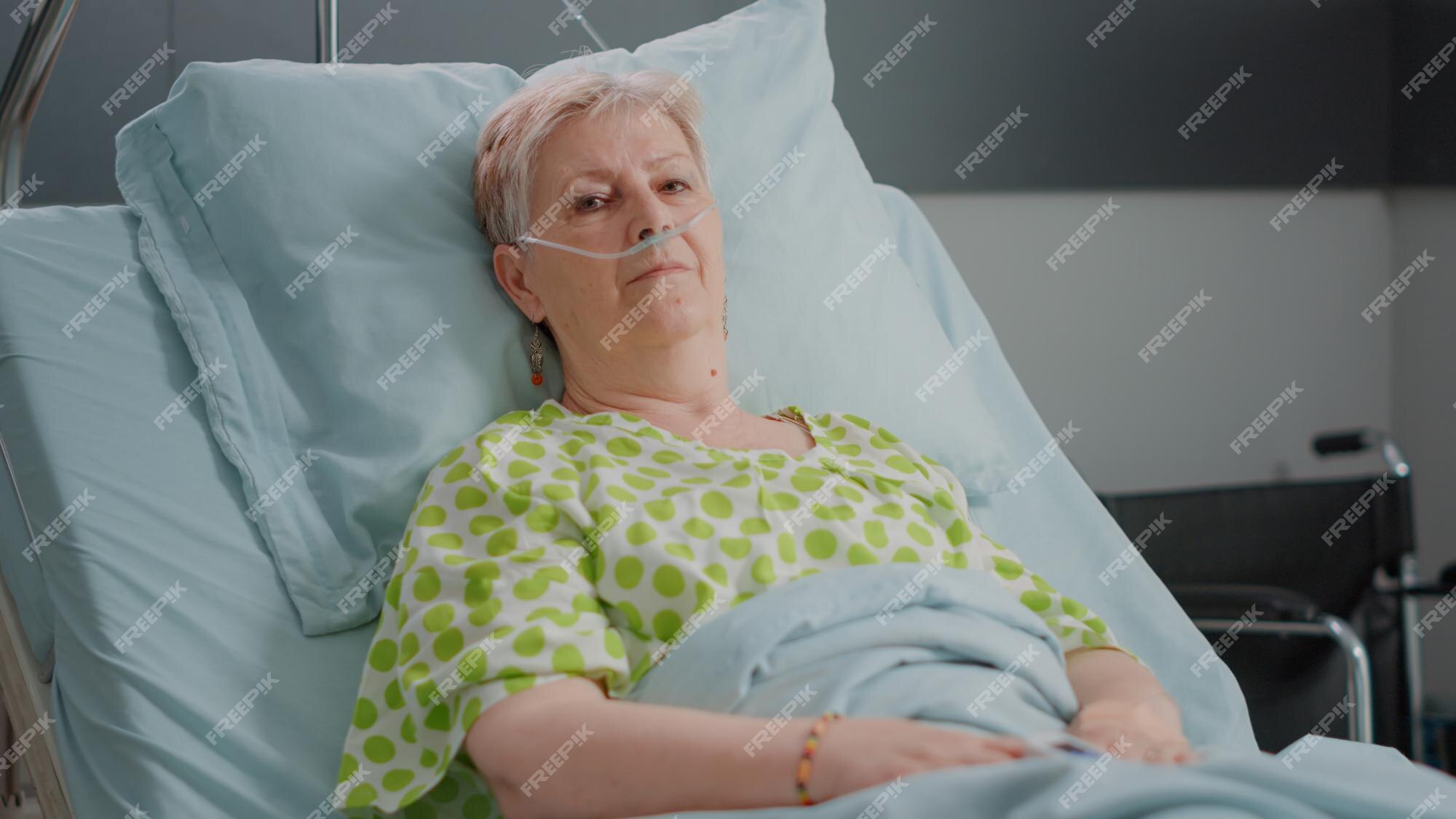 Premium Photo Portrait Of Senior Woman Laying In Hospital Ward Bed With Nasal Oxygen Tube And 