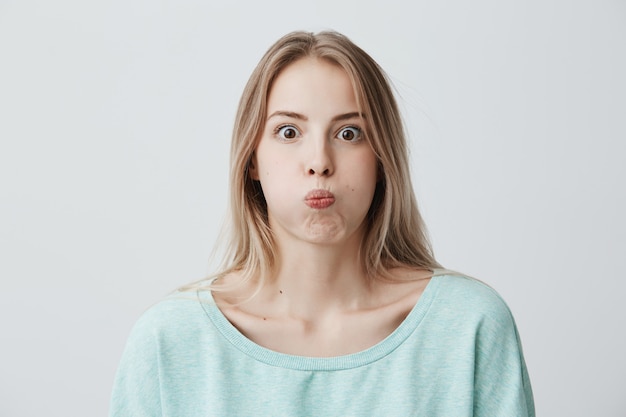 Free Photo | Portrait of shocked astonished young blonde woman with ...