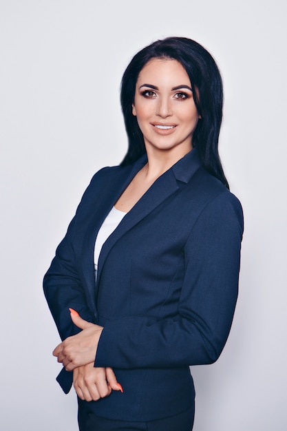 premium-photo-portrait-of-a-smiling-handsome-woman-in-a-business-suit