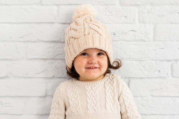 Free Photo | Portrait of smiling little girl with hat