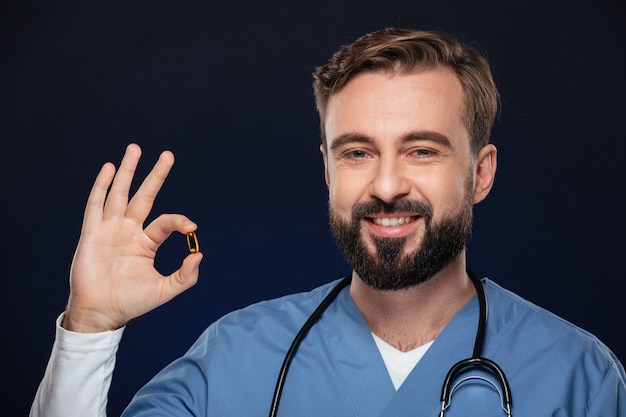 Free Photo | Portrait of a smiling male doctor