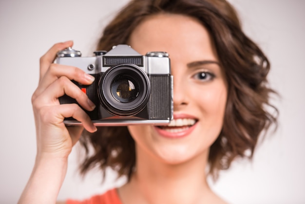 Premium Photo | Portrait of smiling young beauty woman making photo.
