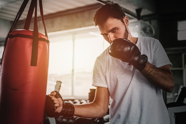 Premium Photo Portrait Sporty Men With The Back Boxing Gloves Training At The Gym