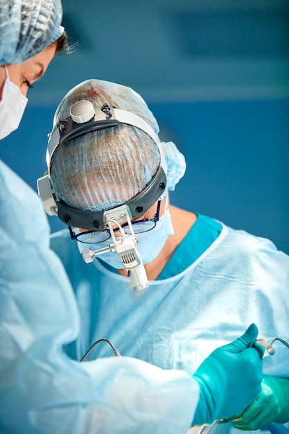 Premium Photo | Portrait of a surgeon close-up. surgeons operate on a ...