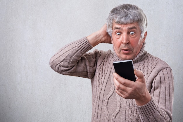 Premium Photo Portrait Of Surprised Senior Man Looking With Wide Open