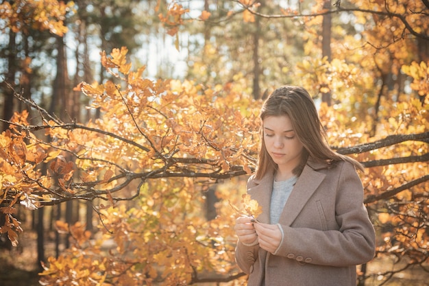 Premium Photo | Portrait of a thoughtful and sad girl. autumn colors ...