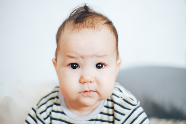 Premium Photo | Portrait of unhappy baby crying out loud