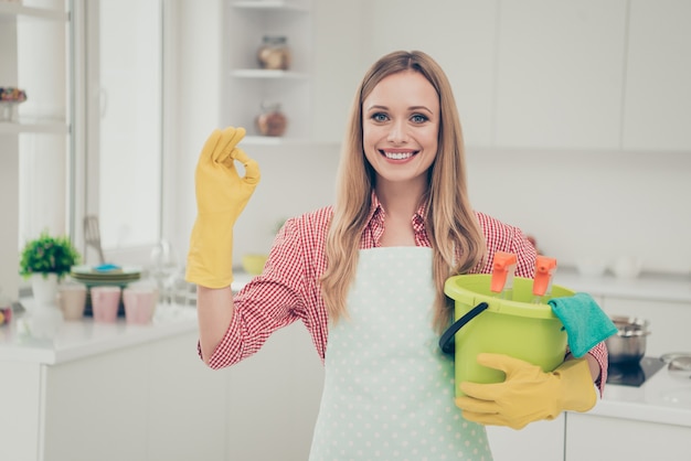 Premium Photo | Portrait woman cleaning the house