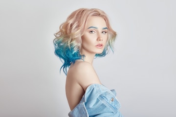 Premium Photo | Portrait woman with bright colored flying hair