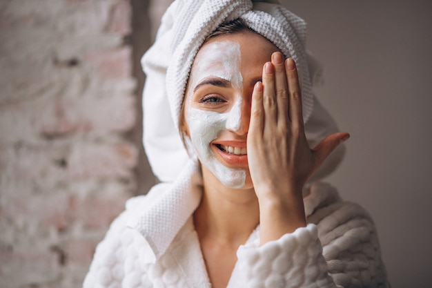Portrait of a woman with a facial mask half face Free Photo