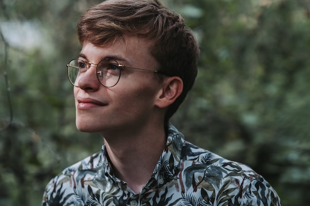 Free Photo | Portrait of a young caucasian male with eyeglasses looking ...