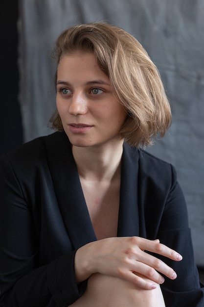 Premium Photo | Portrait of young caucasian woman with short hair ...