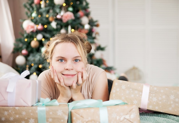 Premium Photo | Portrait of young girl in new year holidays at home.